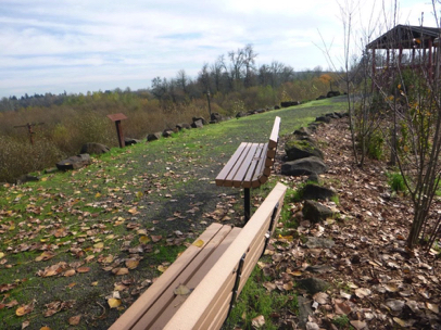 Overlook for the refuge – two benches – natural surface trail with gravel – shelter